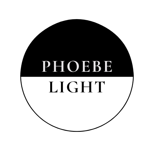 The Phoebe Light Logo is a circle is divided in half horizontally. The top half is solid black and the bottom half is transparent and shows the background image through it. Text is displayed over the top half of the circle and reads 'Phoebe.' The bottom half displays the word 'Light.'